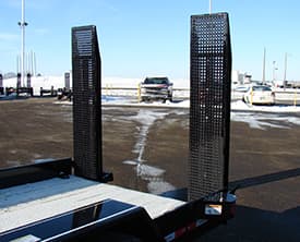 Spring assist drop deck trailer ramps